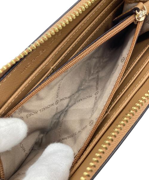 MICHAEL KORS（マイケル・コース）MICHAEL KORS (マイケル・コース) ラウンドジップ長財布 ゴールド×ブラウンの古着・服飾アイテム