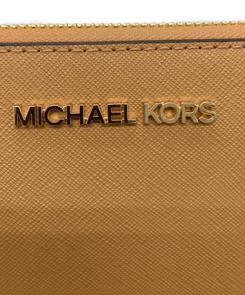 MICHAEL KORS（マイケル・コース）MICHAEL KORS (マイケル・コース) ラウンドジップ長財布 ゴールド×ブラウンの古着・服飾アイテム