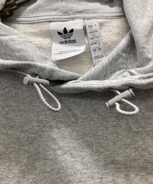 adidas（アディダス）adidas (アディダス) プルオーバーパーカー グレー サイズ:XL 未使用品の古着・服飾アイテム