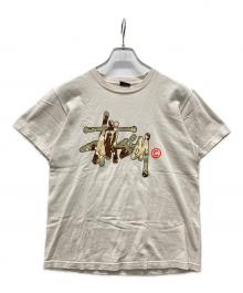 stussy（ステューシー）の古着「カモ柄ロゴTシャツ」｜ベージュ