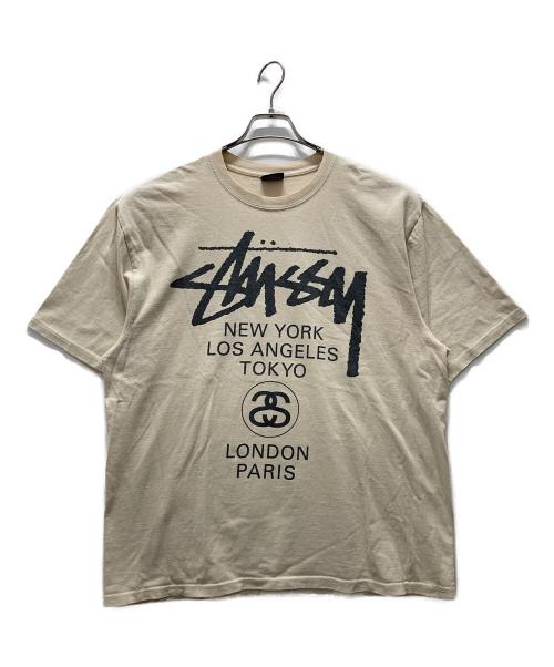stussy（ステューシー）stussy (ステューシー) World Tour Tee ベージュ サイズ:Lの古着・服飾アイテム