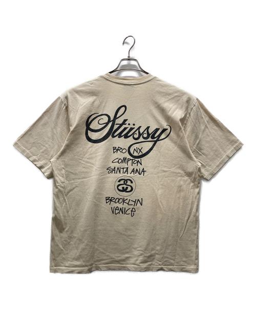 stussy（ステューシー）stussy (ステューシー) World Tour Tee ベージュ サイズ:Lの古着・服飾アイテム