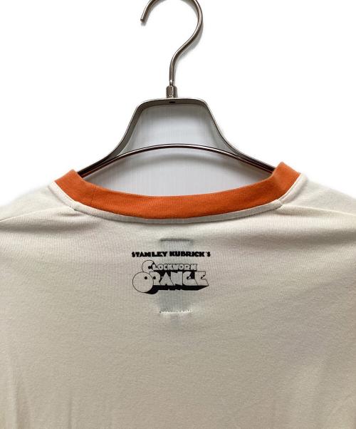 glamb（グラム）glamb (グラム) KUBRICK (キューブリック) ムービーリンガーTシャツ オレンジの古着・服飾アイテム
