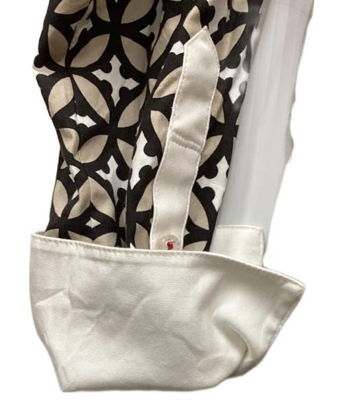 DRESSTERIOR（ドレステリア）DRESSTERIOR (ドレステリア) オーバーラップサークルプリントワンピース ベージュ サイズ:Mの古着・服飾アイテム