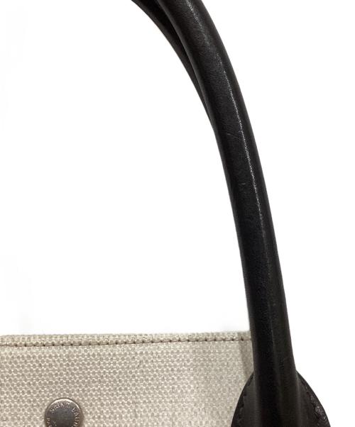 Saint Laurent Paris（サンローランパリ）Saint Laurent Paris (サンローランパリ) RIVE GAUCHEキャンバストートバッグ アイボリーの古着・服飾アイテム