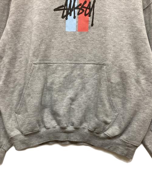 stussy（ステューシー）stussy (ステューシー) プリントパーカー グレー サイズ:Mの古着・服飾アイテム