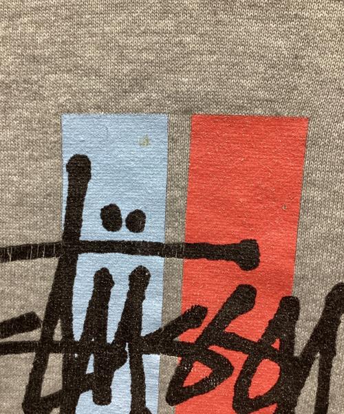 stussy（ステューシー）stussy (ステューシー) プリントパーカー グレー サイズ:Mの古着・服飾アイテム