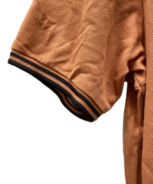 FRED PERRY（フレッドペリー）FRED PERRY (フレッドペリー) ポロシャツ オレンジ サイズ:36の古着・服飾アイテム