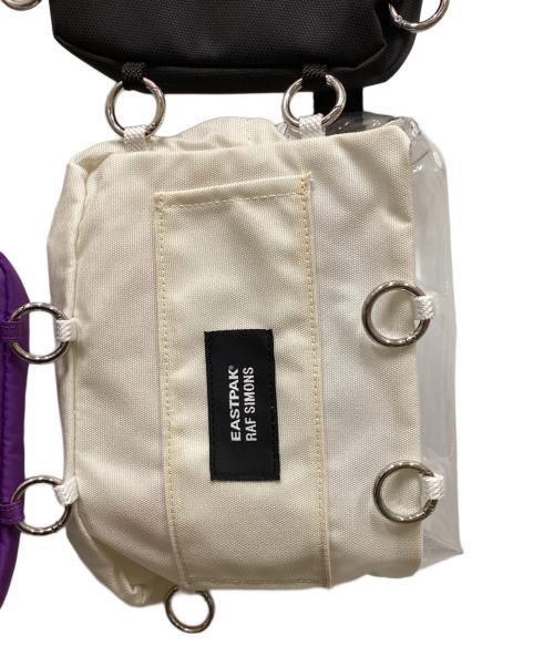 RAF SIMONS（ラフシモンズ）RAF SIMONS (ラフシモンズ) EASTPAK (イーストパック) Pocketbag Loop Garden/ポケットッバッグループガーデン ベージュ×パープルの古着・服飾アイテム
