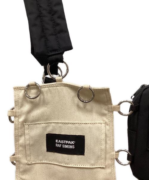 RAF SIMONS（ラフシモンズ）RAF SIMONS (ラフシモンズ) EASTPAK (イーストパック) Pocketbag Loop Garden/ポケットッバッグループガーデン ベージュ×パープルの古着・服飾アイテム