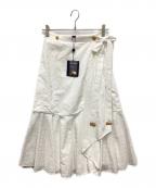 LOUIS VUITTONルイ ヴィトン）の古着「モノグラム レリーフフラウンス ラップ スカート」｜ホワイト