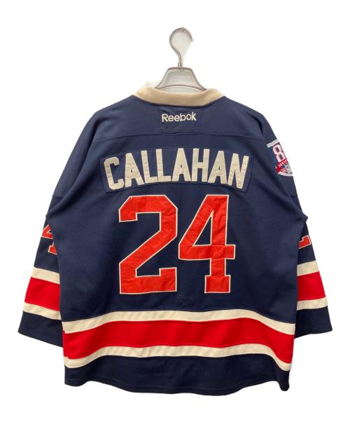 REEBOK（リーボック）REEBOK (リーボック) NHL (エヌエイチエル) ニューヨーク・レンジャーズ ホッケーシャツ ネイビー サイズ:50の古着・服飾アイテム