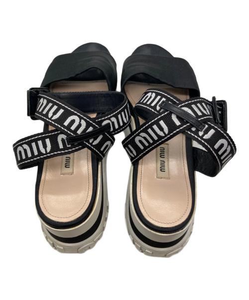 MIU MIU（ミュウミュウ）MIU MIU (ミュウミュウ) 厚底ロゴストラップサンダル ブラック サイズ:38の古着・服飾アイテム