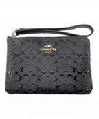 COACHコーチ）の古着「デボスド シグネチャー パテント レザー コーナー ジップ リストレット」｜ブラック