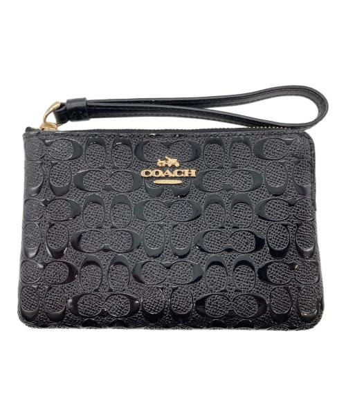 COACH（コーチ）COACH (コーチ) デボスド シグネチャー パテント レザー コーナー ジップ リストレット ブラックの古着・服飾アイテム