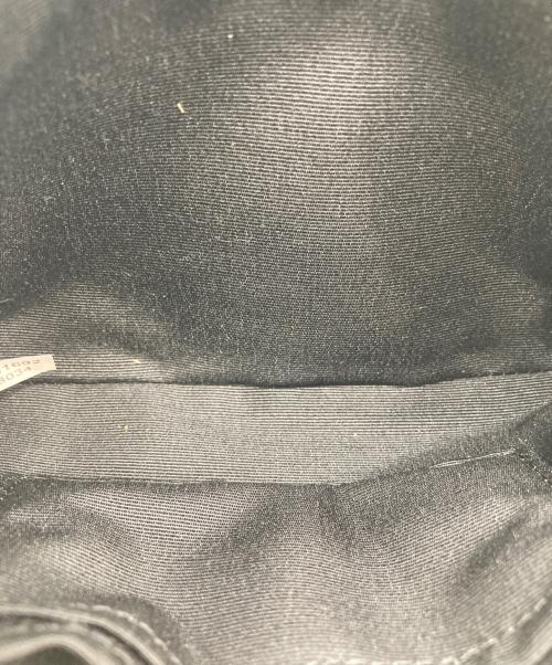 COACH（コーチ）COACH (コーチ) デボスド シグネチャー パテント レザー コーナー ジップ リストレット ブラックの古着・服飾アイテム