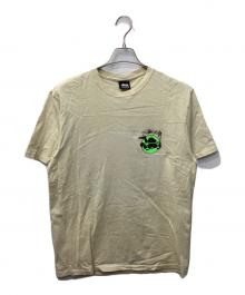 stussy（ステューシー）の古着「SKATEMAN TEE（スケートマンティー）」｜ベージュ