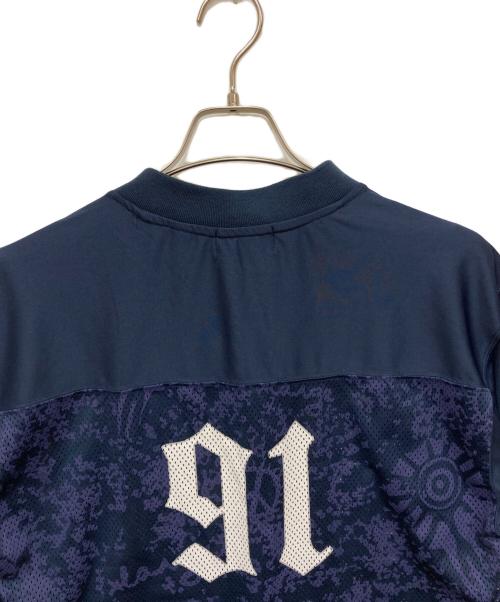 X-LARGE（エクストララージ）X-LARGE (エクストララージ) OLD ENGLISH FOOTBALL JERSEY/オールドイングリッシュフットボールジャージ ネイビー サイズ:Mの古着・服飾アイテム