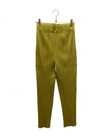 PLEATS PLEASE（プリーツプリーズ）の古着「プリーツパンツ」｜イエロー