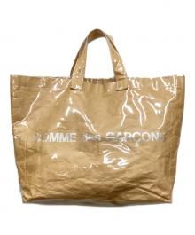 COMME des GARCONS（コムデギャルソン）の古着「PVCペーパーロゴトートバッグ」｜ベージュ