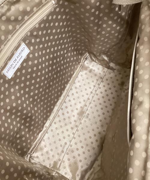 SALON DE ALFURD（サロン・ド・アルファード）SALON DE ALFURD (サロン・ド・アルファード) スマイルジャグジートート ベージュの古着・服飾アイテム