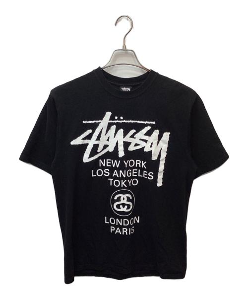 stussy（ステューシー）stussy (ステューシー) World tour tee（ワールドツアーティー） ブラック サイズ:Mの古着・服飾アイテム