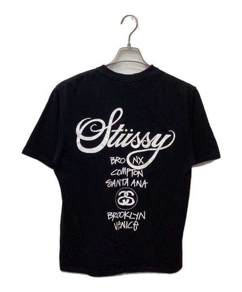 stussy（ステューシー）stussy (ステューシー) World tour tee（ワールドツアーティー） ブラック サイズ:Mの古着・服飾アイテム