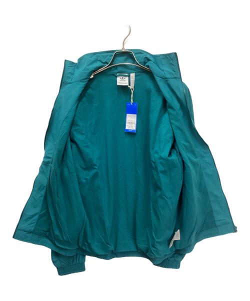 adidas（アディダス）adidas (アディダス) アディカラー ウーブン ファイヤーバード トラックトップ スカイブルー サイズ:XLの古着・服飾アイテム