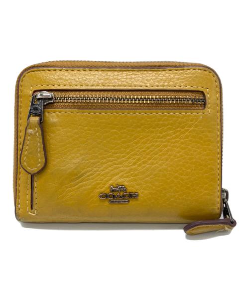 COACH（コーチ）COACH (コーチ) PEANUTS (ピーナッツ) ラウンドジップウォレット イエローの古着・服飾アイテム