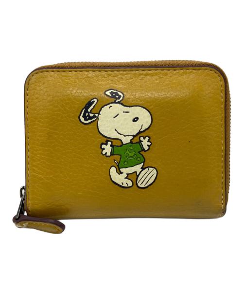 COACH（コーチ）COACH (コーチ) PEANUTS (ピーナッツ) ラウンドジップウォレット イエローの古着・服飾アイテム