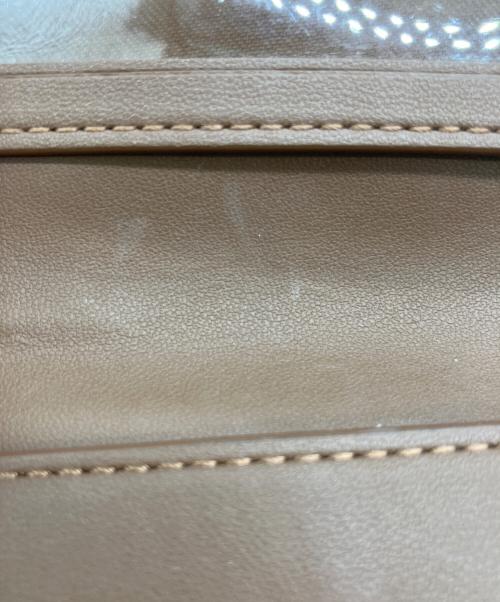 COACH（コーチ）COACH (コーチ) PEANUTS (ピーナッツ) ラウンドジップウォレット イエローの古着・服飾アイテム