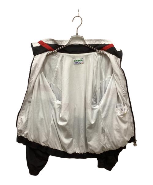 DIADORA（ディアドラ）DIADORA (ディアドラ) テープラインナイロンジャケット ホワイト×ブラック サイズ:48の古着・服飾アイテム