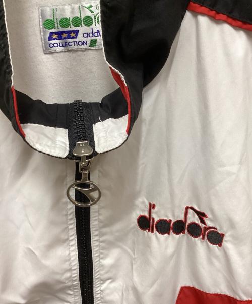 DIADORA（ディアドラ）DIADORA (ディアドラ) テープラインナイロンジャケット ホワイト×ブラック サイズ:48の古着・服飾アイテム