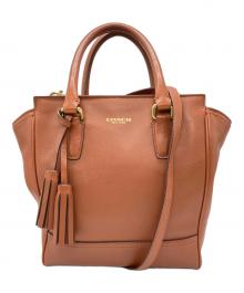 COACH（コーチ）の古着「レガシー ミニタナー 2wayバッグ」｜ブラウン