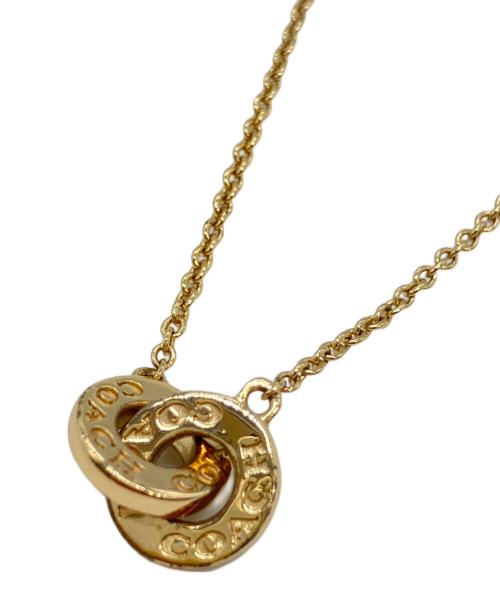 COACH（コーチ）COACH (コーチ) インターロッキング オープン サークル ペンダント ネックレス ゴールドの古着・服飾アイテム