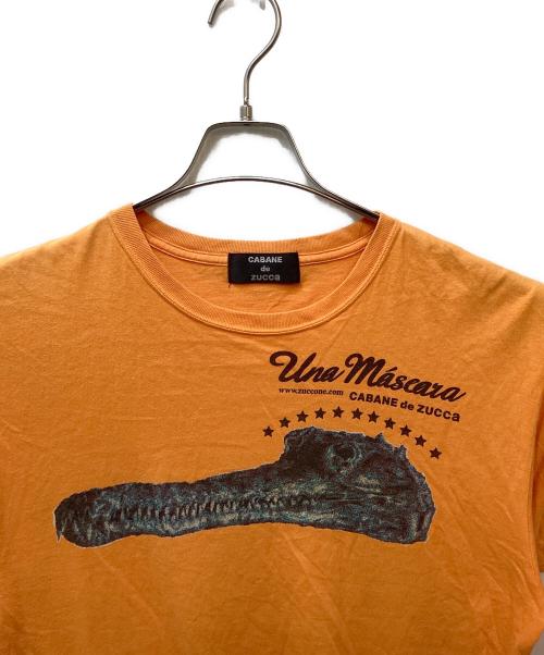 CABANE de ZUCCa（カバンドズッカ）CABANE de ZUCCa (カバンドズッカ) プリントTシャツ オレンジ サイズ:Mの古着・服飾アイテム
