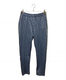 LACOSTE（ラコステ）の古着「モノグラムジャガードトラックパンツ」｜スカイブルー