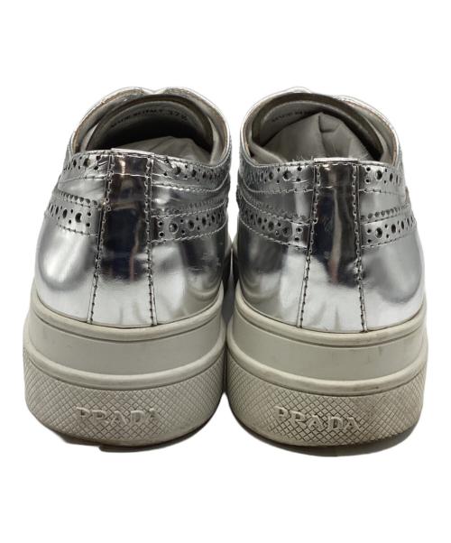 PRADA（プラダ）PRADA (プラダ) ウイングチップスニーカー シルバー サイズ:37  1／2の古着・服飾アイテム