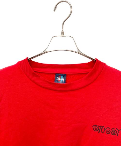 stussy（ステューシー）stussy (ステューシー) シャドーマンバックプリントクルーネックスウェット レッド サイズ:Lの古着・服飾アイテム