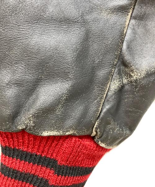 FLYNNTAN LEATHER（フライングタン レザー）FLYNNTAN LEATHER (フライングタン レザー) スタジャン レッド サイズ:採寸参照の古着・服飾アイテム