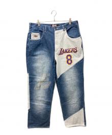 UNK DENIM（ユーエヌケー デニム）の古着「NBAパッチワークデニムパンツ」｜インディゴ