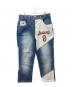 UNK DENIM（ユーエヌケー デニム）の古着「NBAパッチワークデニムパンツ」｜インディゴ