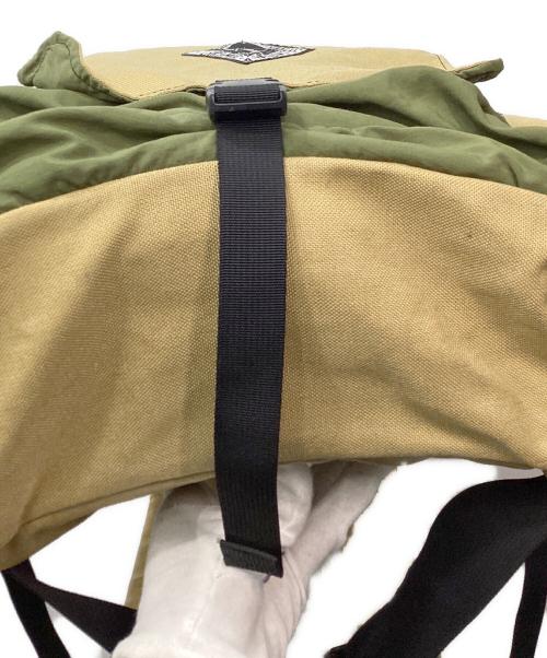 ATMOSPHERE MOUNTAINWORKS（アトモスフィアマウンテンワークス）Atmosphere Mountainworks (アトモスフィアマウンテンワークス) フラップリュック ブラウンの古着・服飾アイテム