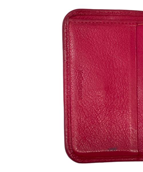 Yves Saint Laurent（イヴサンローラン）Yves Saint Laurent (イヴサンローラン) YSLダブルホック2つ折財布 ピンクの古着・服飾アイテム