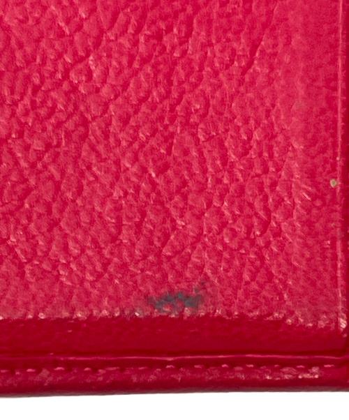Yves Saint Laurent（イヴサンローラン）Yves Saint Laurent (イヴサンローラン) YSLダブルホック2つ折財布 ピンクの古着・服飾アイテム