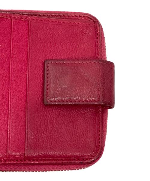 Yves Saint Laurent（イヴサンローラン）Yves Saint Laurent (イヴサンローラン) YSLダブルホック2つ折財布 ピンクの古着・服飾アイテム