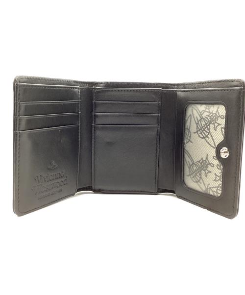 Vivienne Westwood（ヴィヴィアンウエストウッド）Vivienne Westwood (ヴィヴィアンウエストウッド) エンボス加工3つ折り財布 ブラックの古着・服飾アイテム