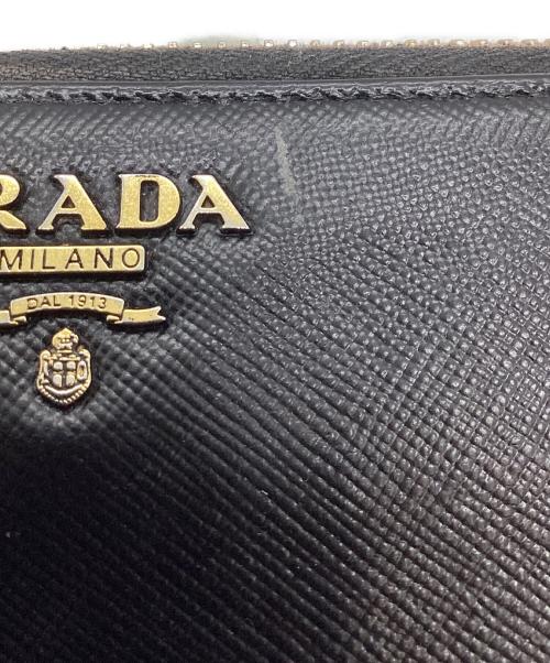 PRADA（プラダ）PRADA (プラダ) ラウンド ジップウォレット ブラックの古着・服飾アイテム