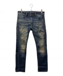 DIESEL（ディーゼル）の古着「ダメージ加工デニムパンツ」｜インディゴ