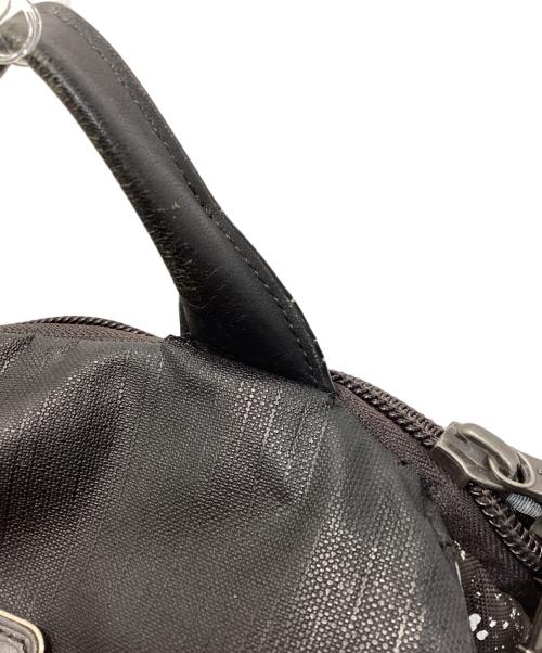 TUMI（トゥミ）TUMI (トゥミ) Kinser フラップバックパック ブラック×ブラウンの古着・服飾アイテム